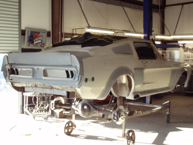 Passenger-side body kit mock-up and fitment, illustrating the level of modification required